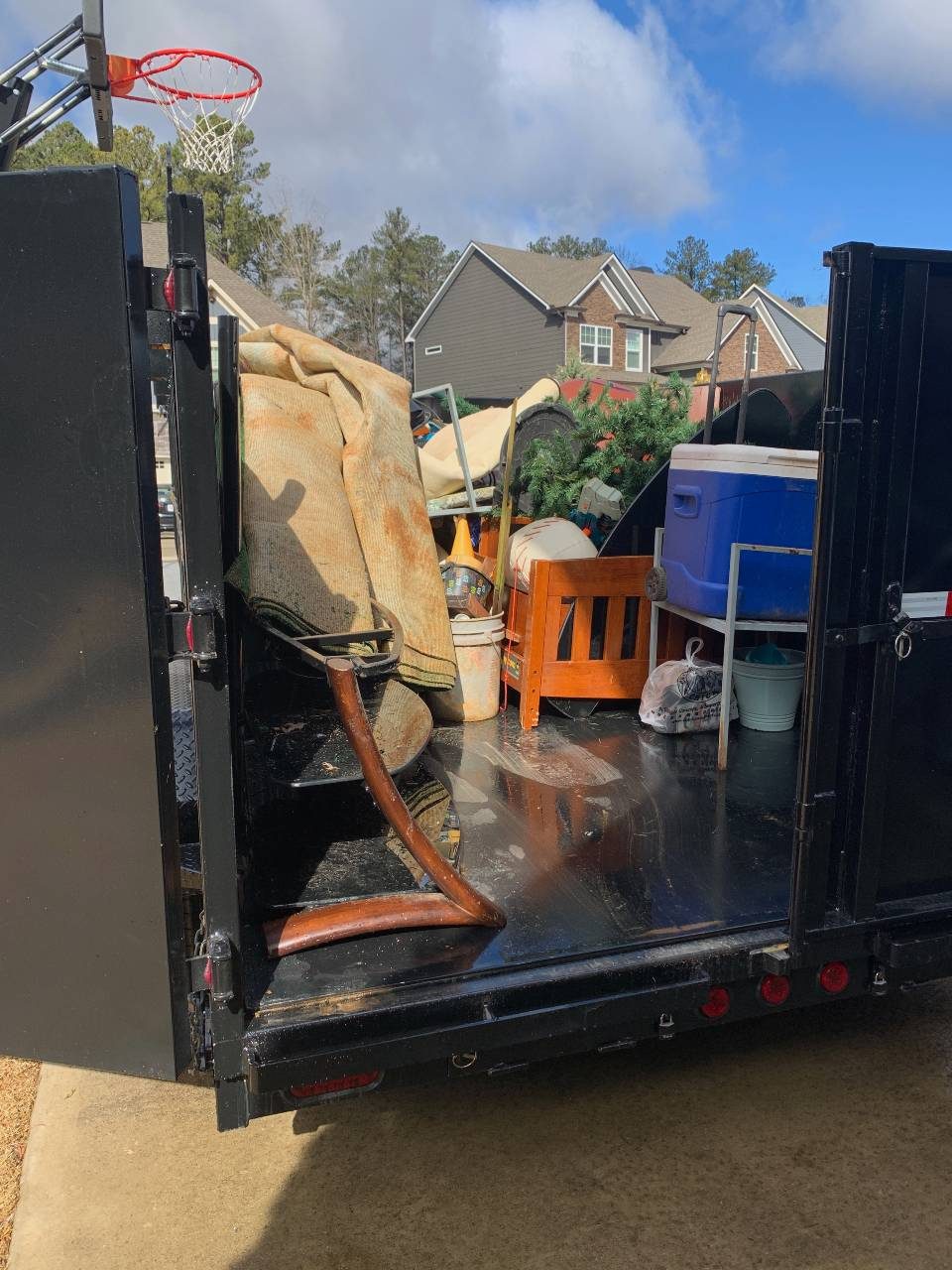 Household junk loaded in the trailer